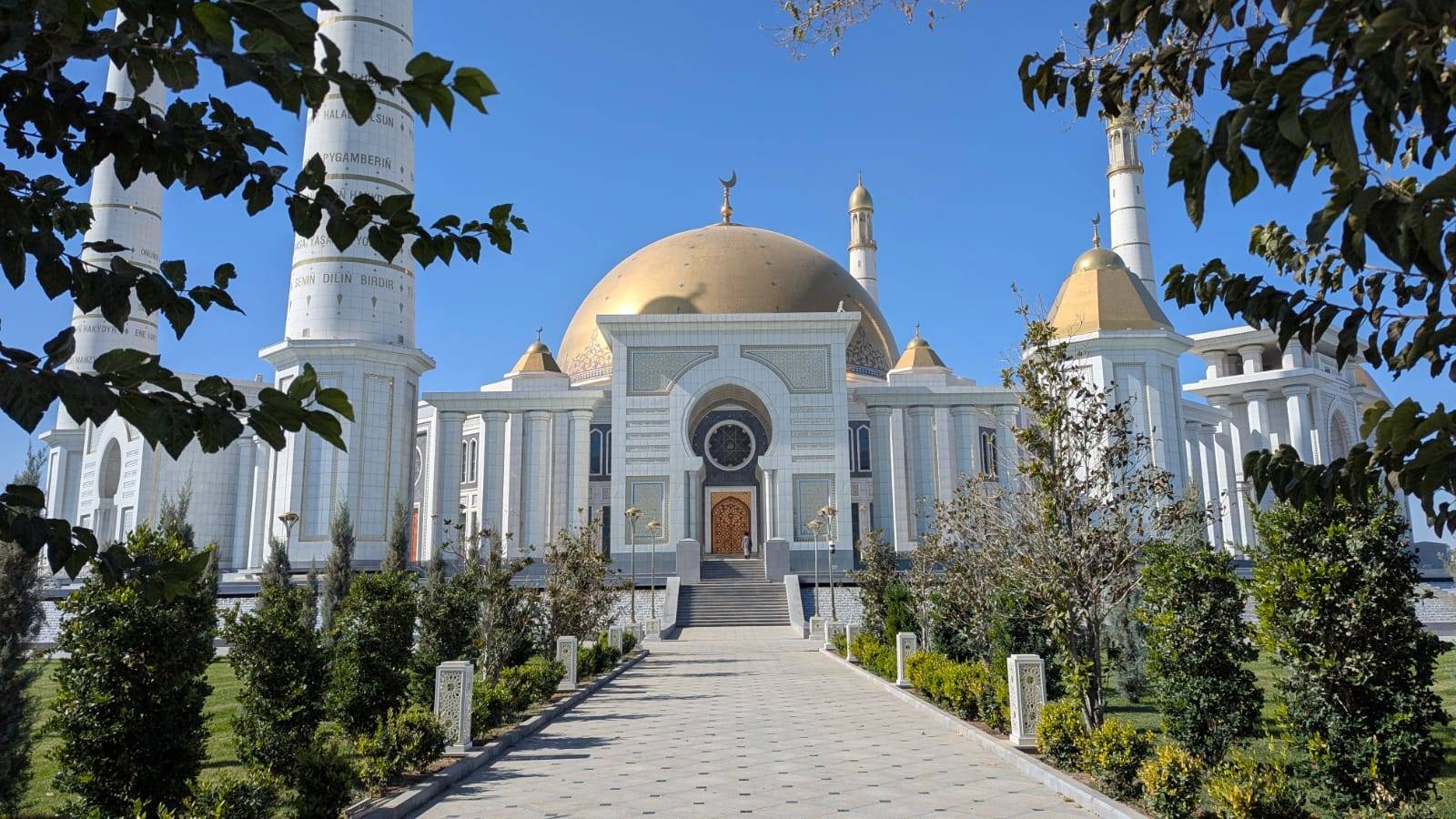 4 Day Turkmenistan Tour: Farab to Shavat via Merv, Ashgabat & Darvaza Turkmenbashi Ruhy Mosque with its huge golden dome, minarets and landscaped gardens near Ashgabat