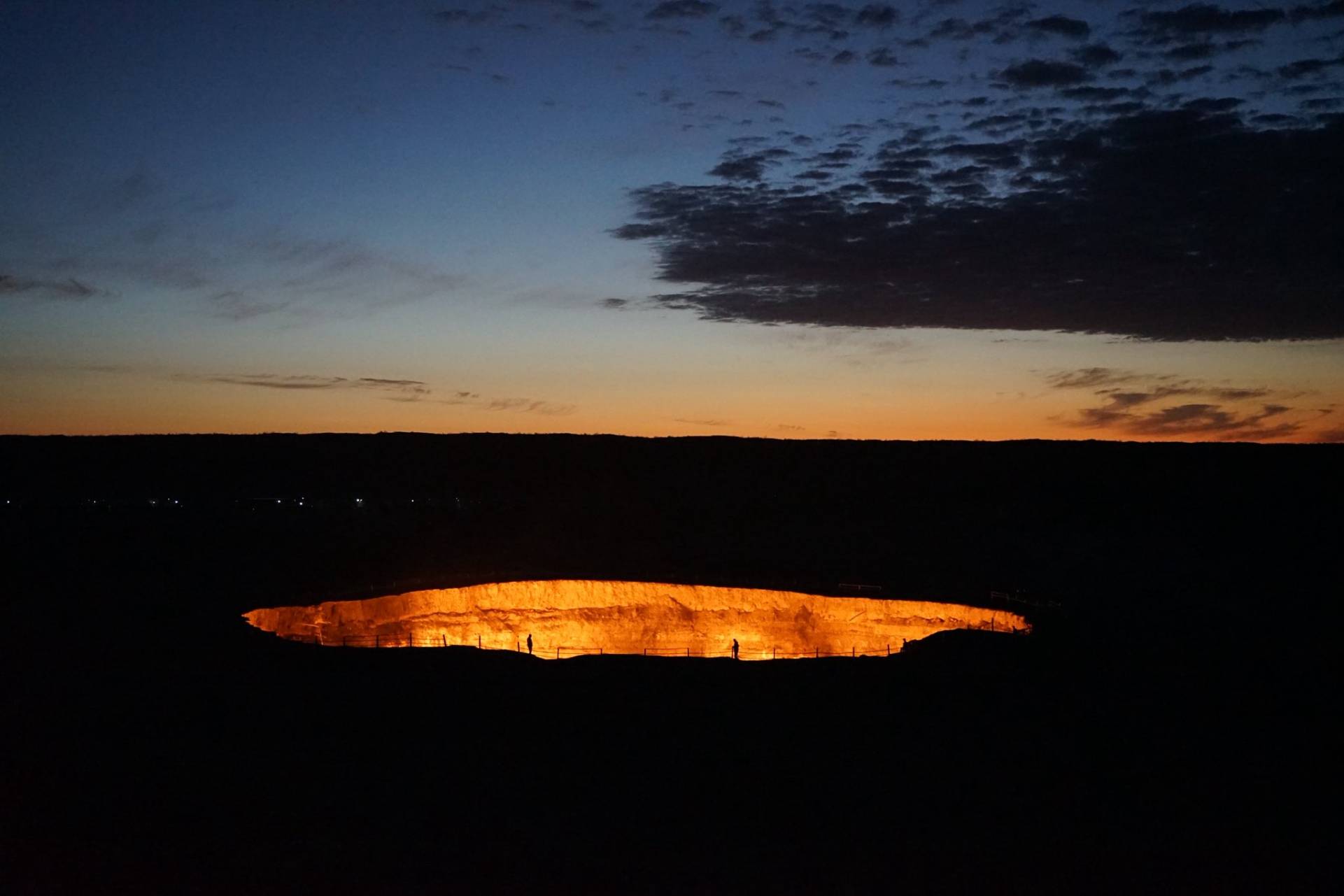 2 Day Turkmenistan Tour from Khiva to Darvaza Gas Crater Darvaza Gas Crater glowing at sunrise in the Karakum Desert