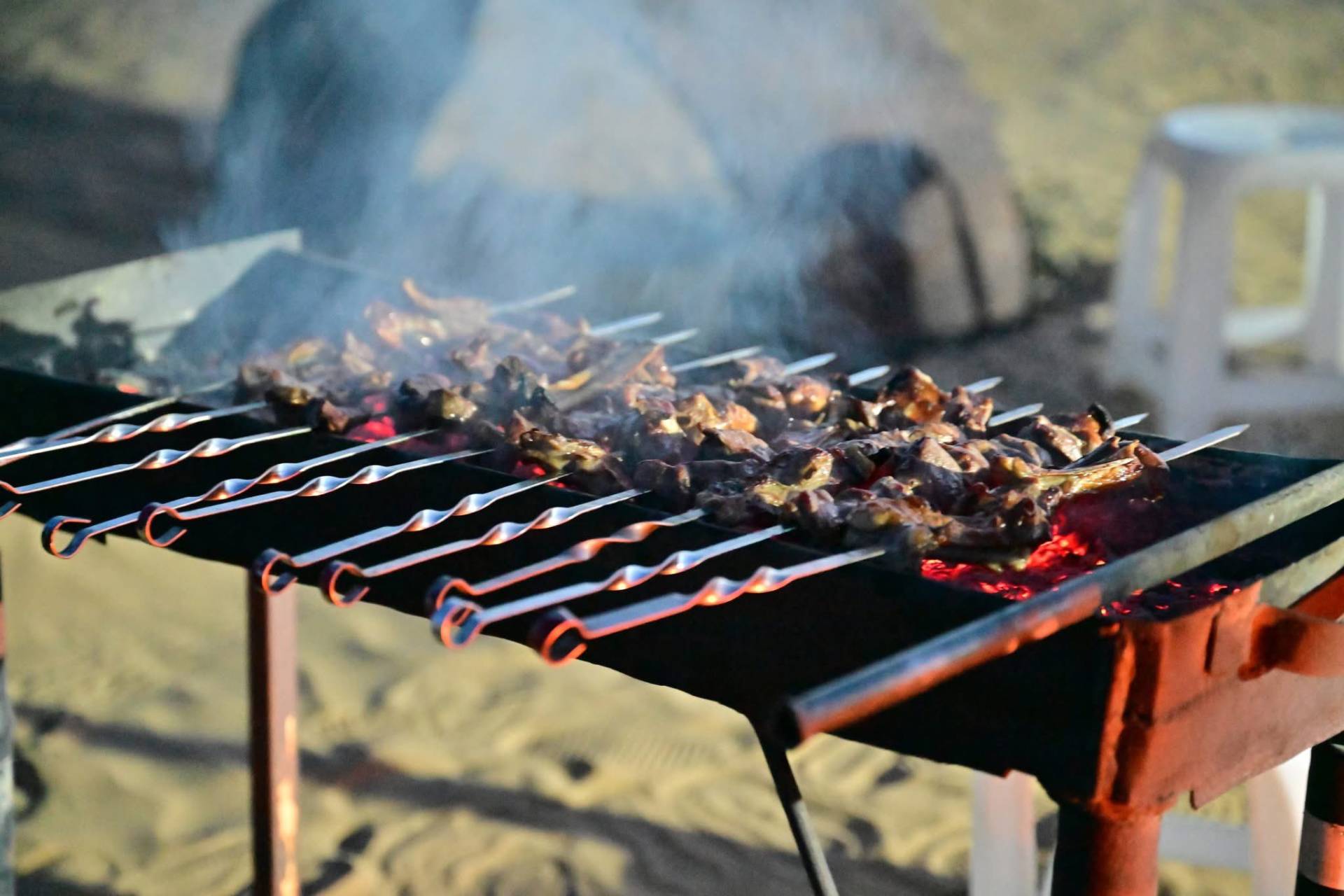 2 Day Turkmenistan Tour from Khiva to Darvaza Gas Crater Traditional Turkmen kebabs prepared for travelers at Darvaza yurt camp
