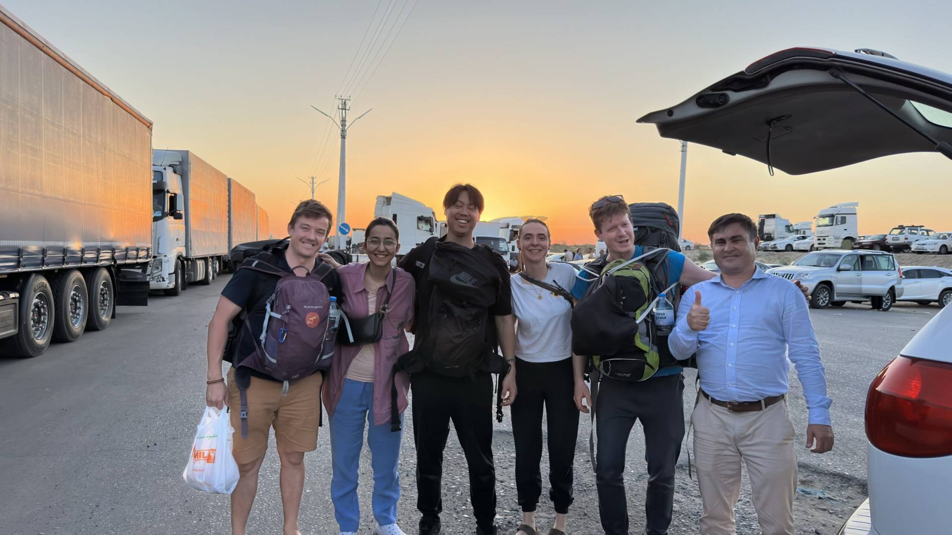 1 Day Turkmenistan Tour from Bukhara to Turkmenabat Travelers with their local guide at Farab Border after a day tour in Turkmenabat