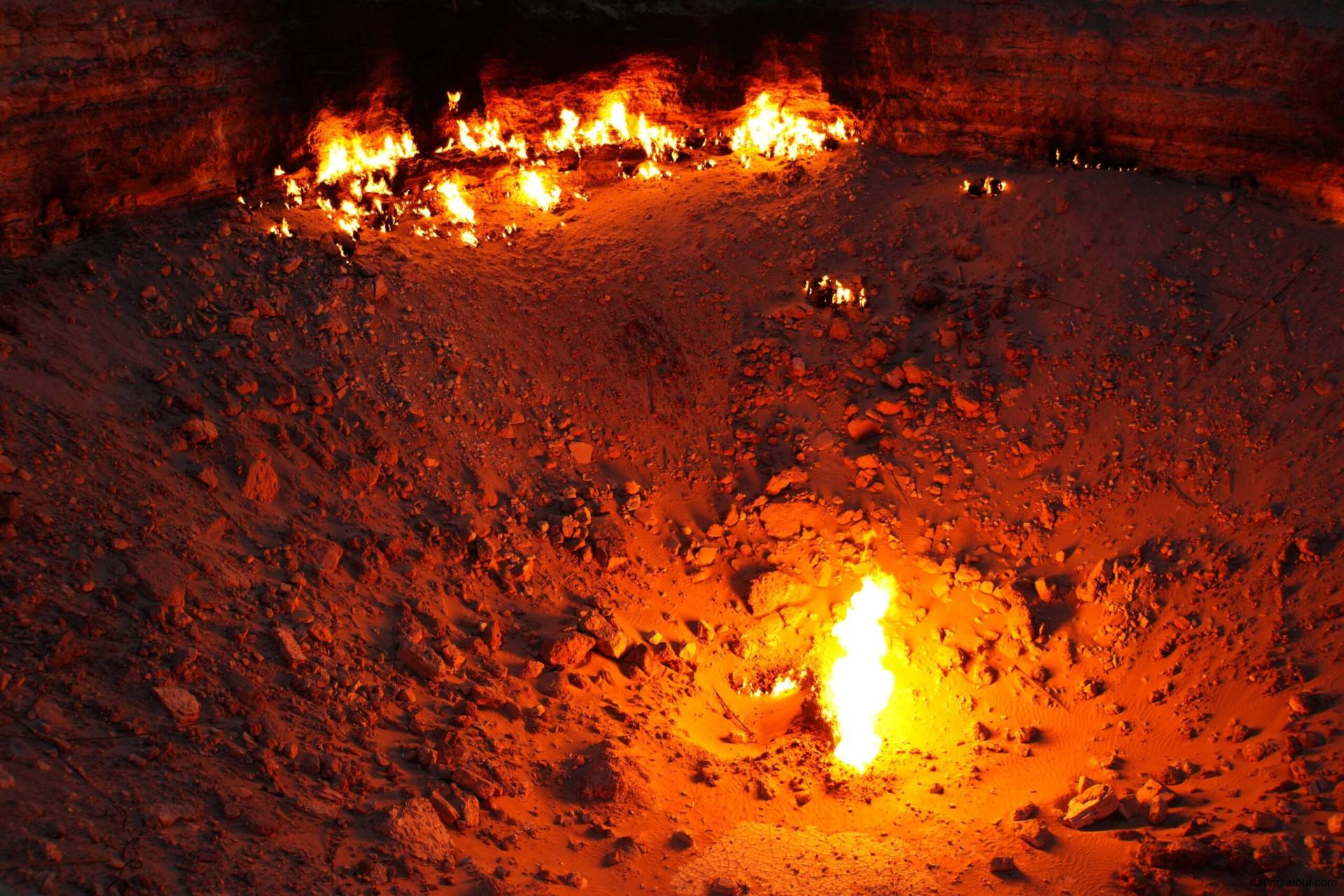 3 Day Turkmenistan Tour from Ashgabat: Darvaza & Night Train to Bukhara Flames burning inside the Darvaza Gas Crater in Turkmenistan