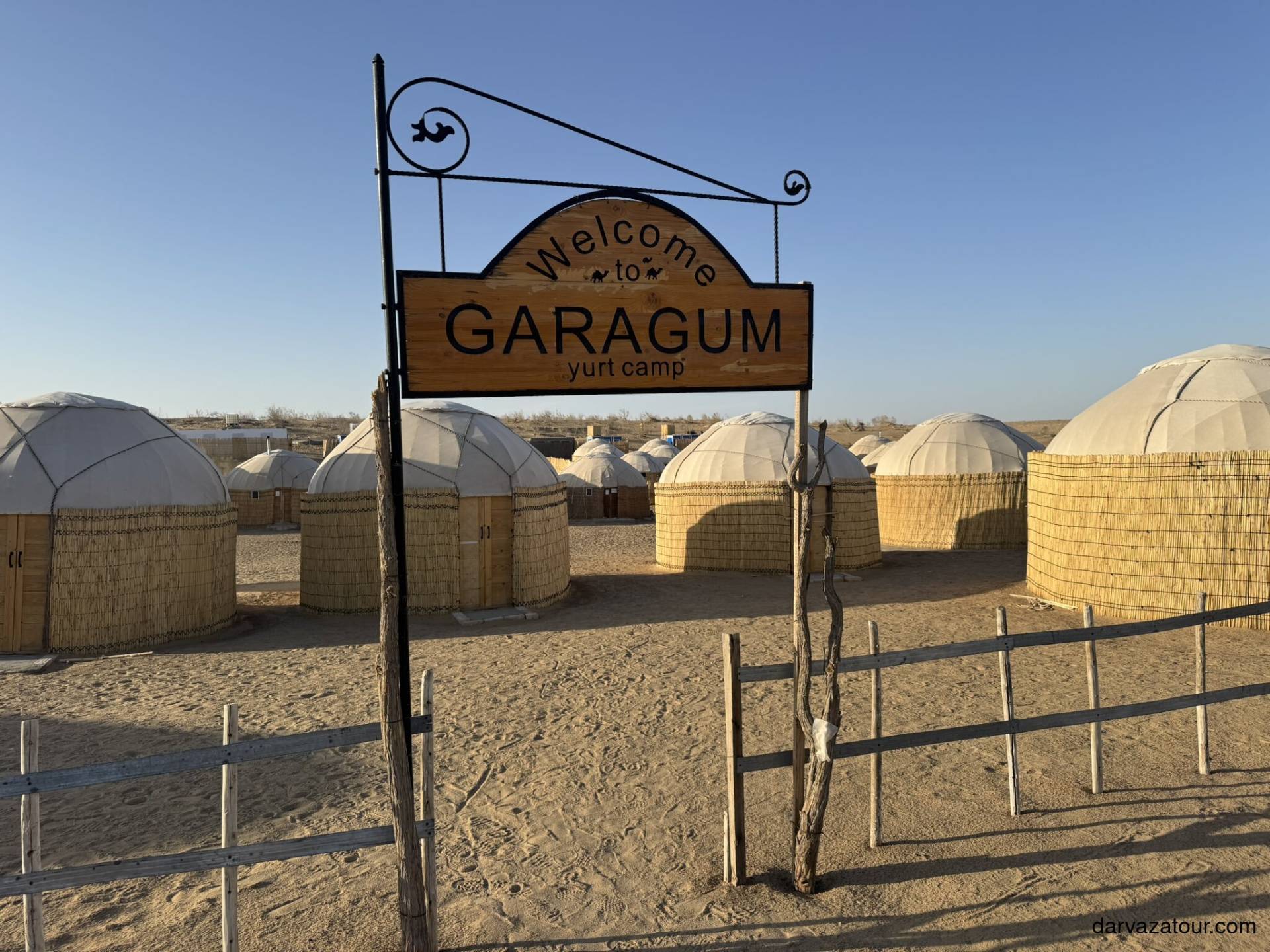Darvaza Yurt Camp Entrance sign to Garagum Yurt Camp with traditional Turkmen yurts near Darvaza Gas Crater