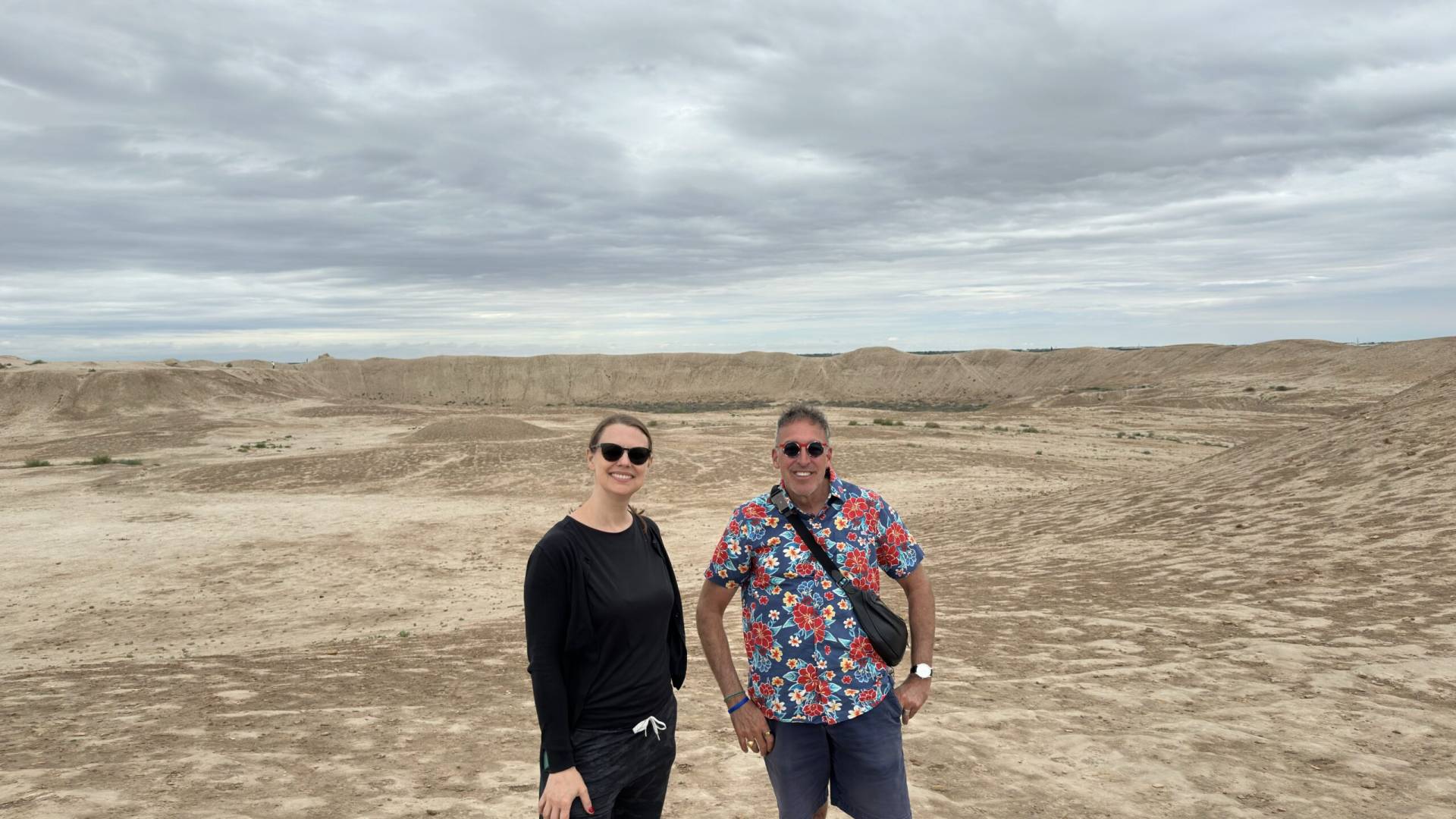2 Day Turkmenistan Tour from Bukhara: Merv & Ashgabat American tourists visiting the ancient ruins of Merv and exploring the historic Gyaur Kala site