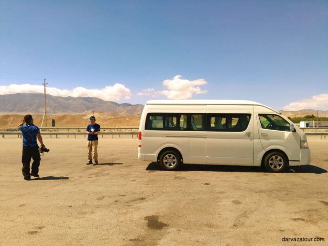 Turkmenistan travel, tour transportation, Ashgabat region, Turkmen landscapes, desert road, mountain views, Turkmenistan tourism, Darvaza tour vehicle