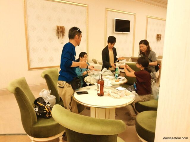 An image of dinner at Bagt Koşgi Hotel, where guests enjoy local culinary delights in a cozy setting.