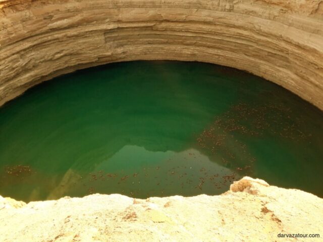 Stunning green water crater in Turkmenistan near Darvaza Gas Crater - natural wonder in Karakum Desert, tourist attraction, unique geological formation with emerald waters, must-visit destination on Turkmenistan tours