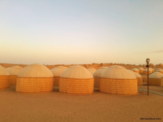 Traditional Turkmen desert yurts in Karakum Desert, Turkmenistan tourism, nomadic accommodation near Darvaza Gas Crater
