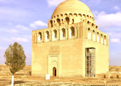 Historic Sultan Sanjar Mausoleum in ancient Merv, Turkmenistan - UNESCO World Heritage site showcasing medieval Islamic architecture with distinctive dome and brick construction