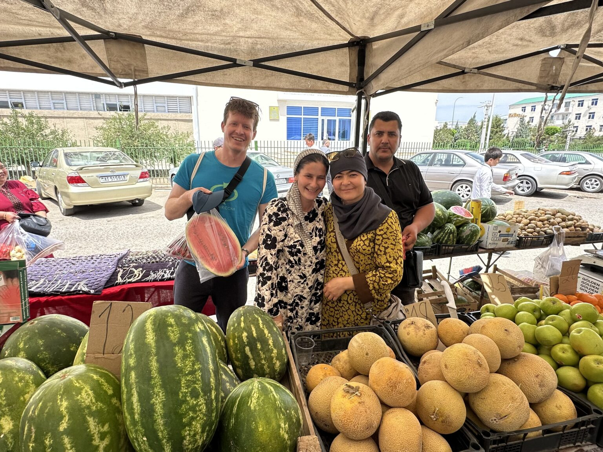 Tourists shopping at Gok Bazaar in Turkmenabat during a Turkmenistan Tour from Bukhara