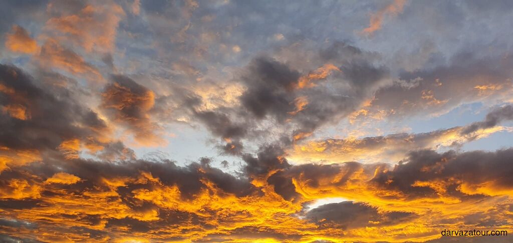 Cheese pide served on a wooden tray in Ashgabat restaurant, enjoyed by tourists.
