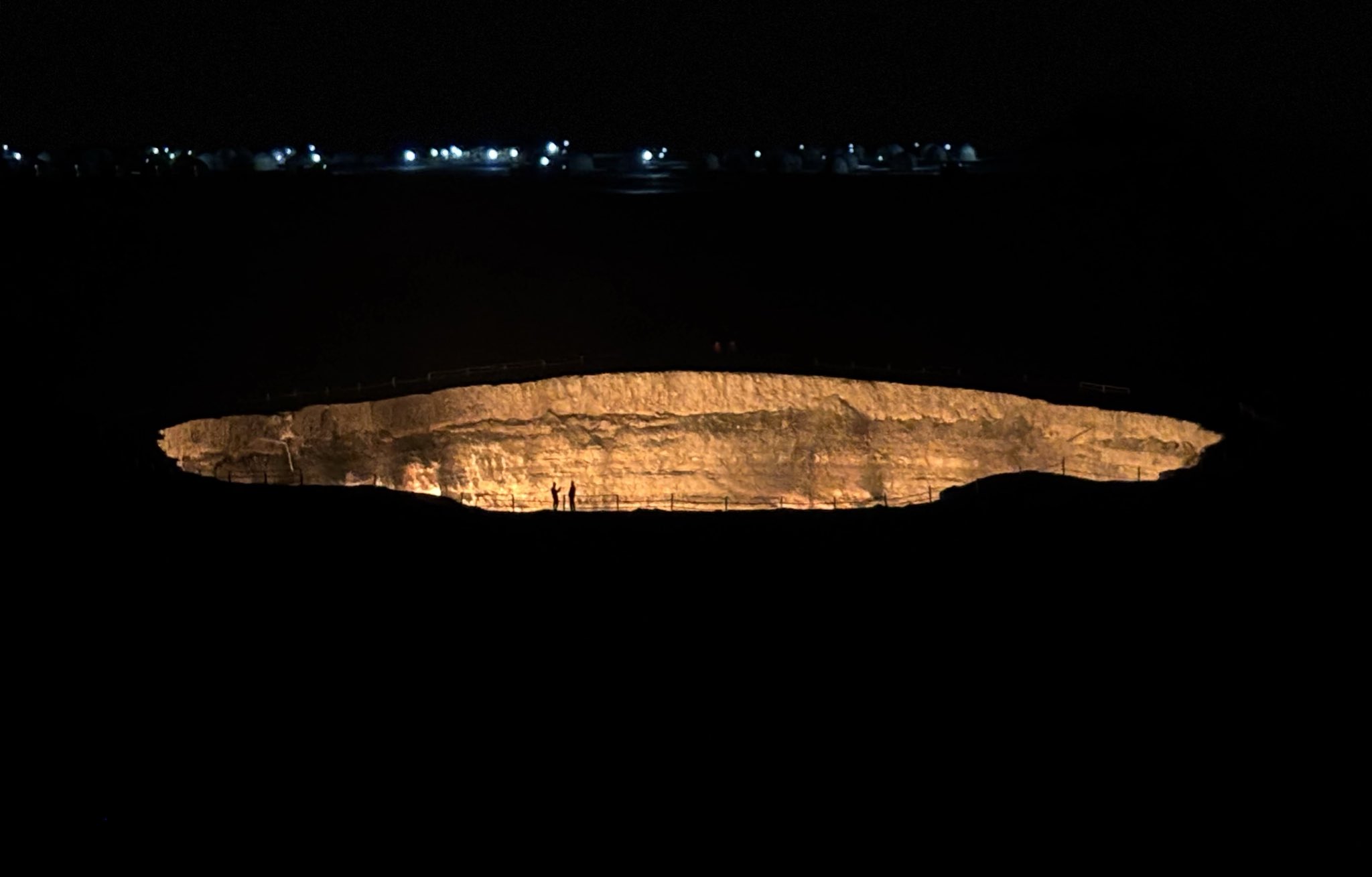 Cheese pide served on a wooden tray in Ashgabat restaurant, enjoyed by tourists.