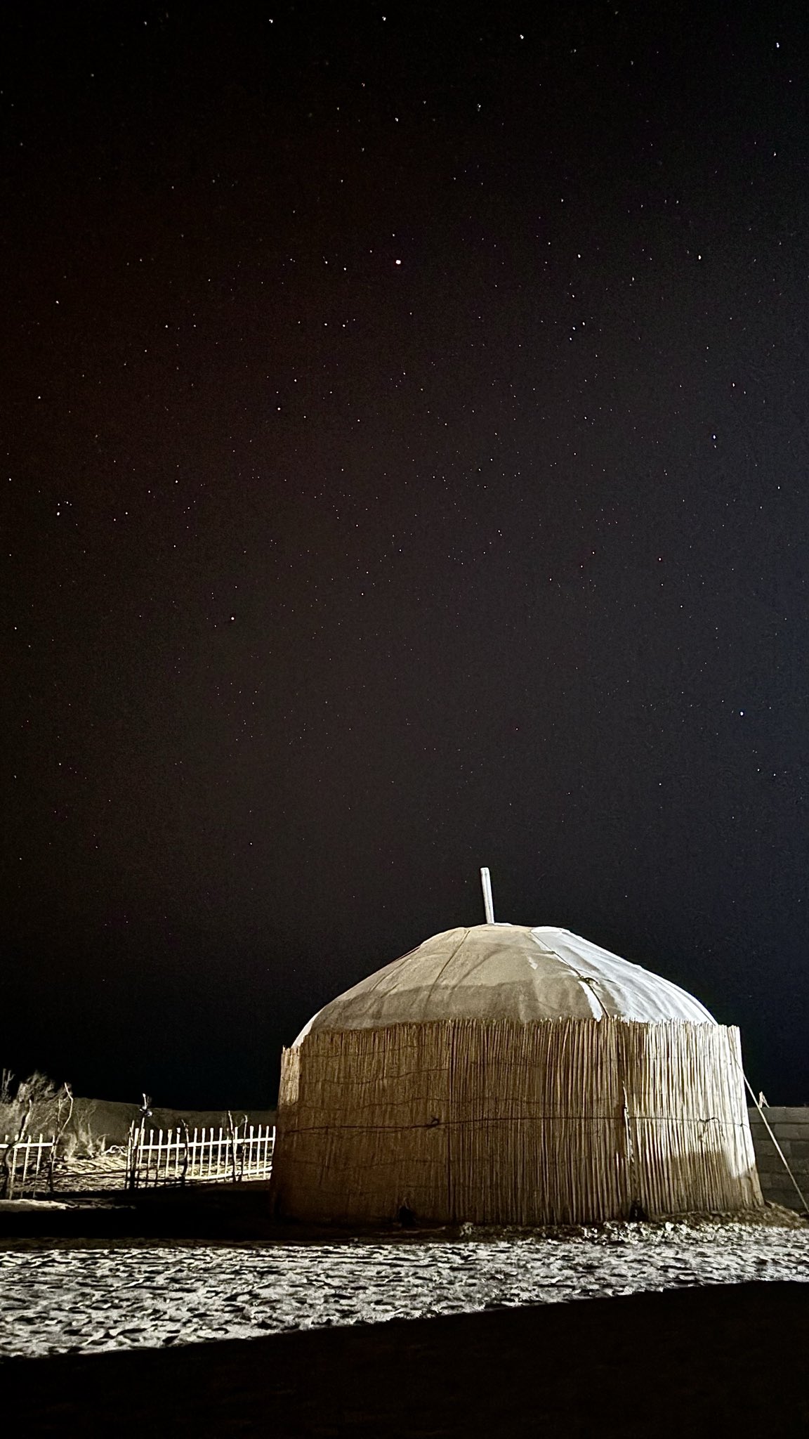 This photo was taken in Darvaza. After photographing the night sky, I also took a picture with a Turkmen yurt so tourists can see that this is really Turkmenistan. The yurt is lit a little, so some stars are not visible because of the light reflection. This is a traditional Turkmen yurt near Darvaza, about 4 meters wide, with a chimney on top that is used in December with a diesel heater that has no smell and is very economical.