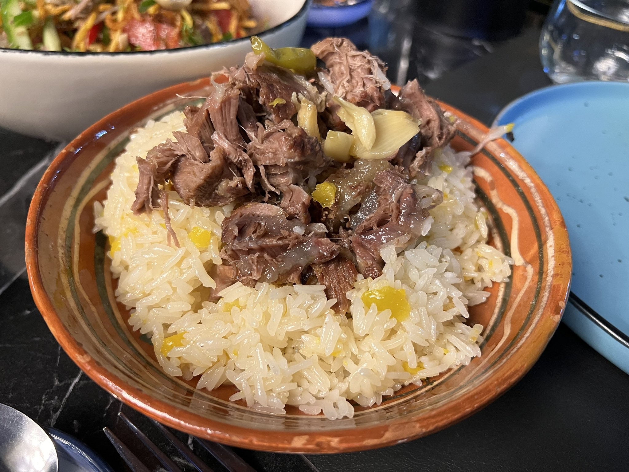 Traditional Turkmen palaw with meat and rice served in a national bowl at Tünç Çay Restaurant in Ashgabat.
