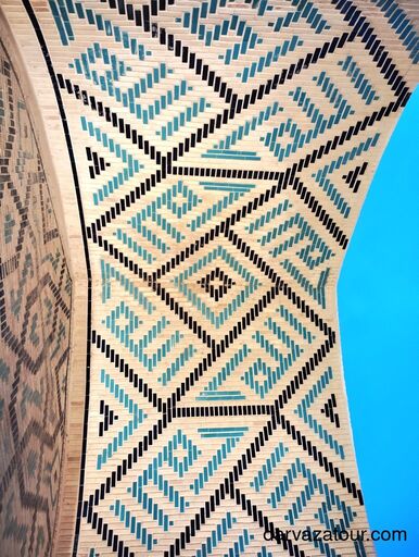 Intricate Islamic tile pattern with Arabic calligraphy ‘Allah’ inside ancient mausoleum in Merv, Turkmenistan – Seljuk-era architecture and design