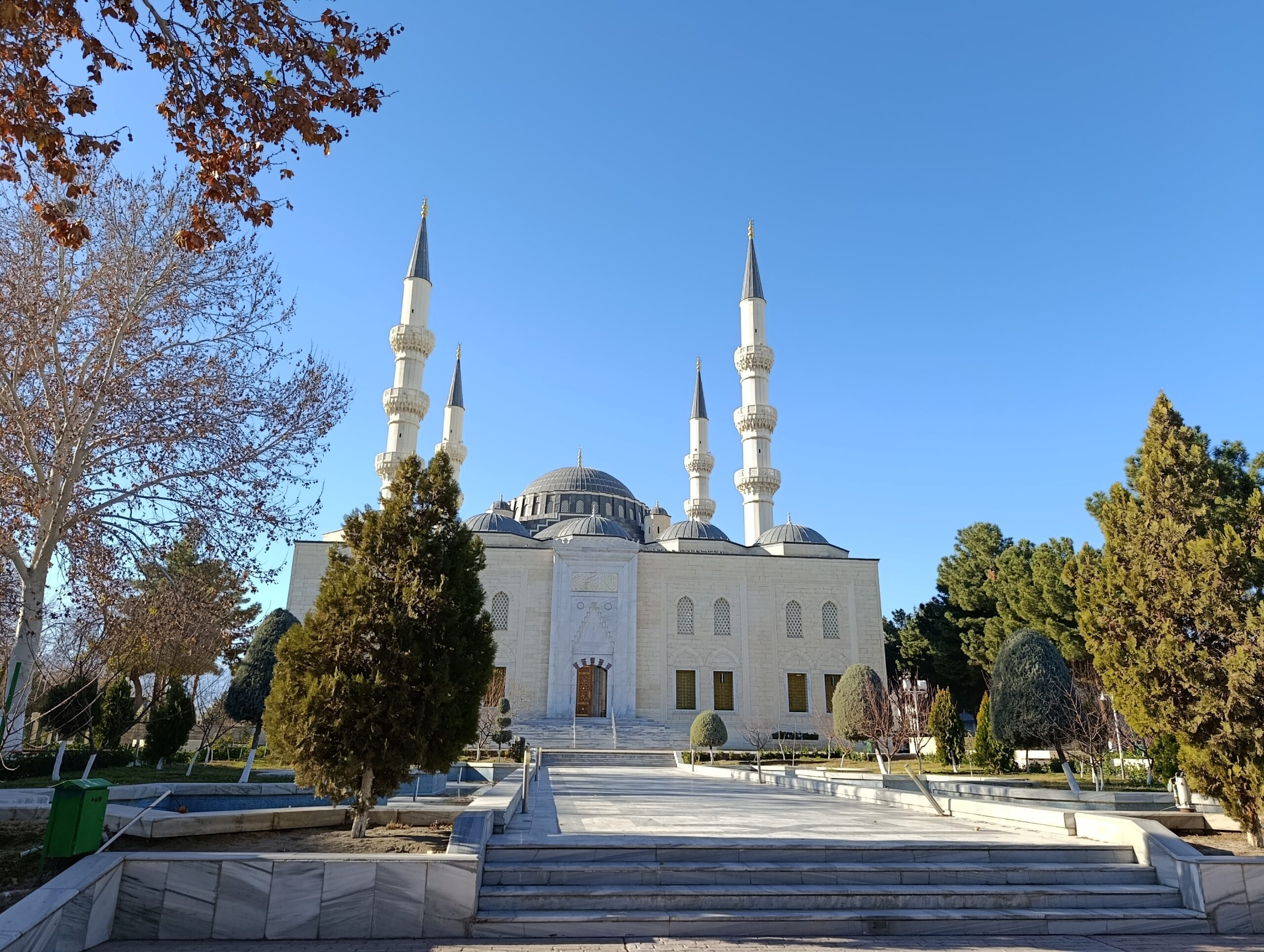 Exterior view of the Ertugrul Gazi Mosque with four minarets in Ashgabat, Turkmenistan