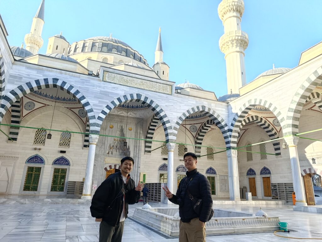 Ornate interior dome, chandeliers and Islamic decorations inside Ertugrul Gazi Mosque in Ashgabat