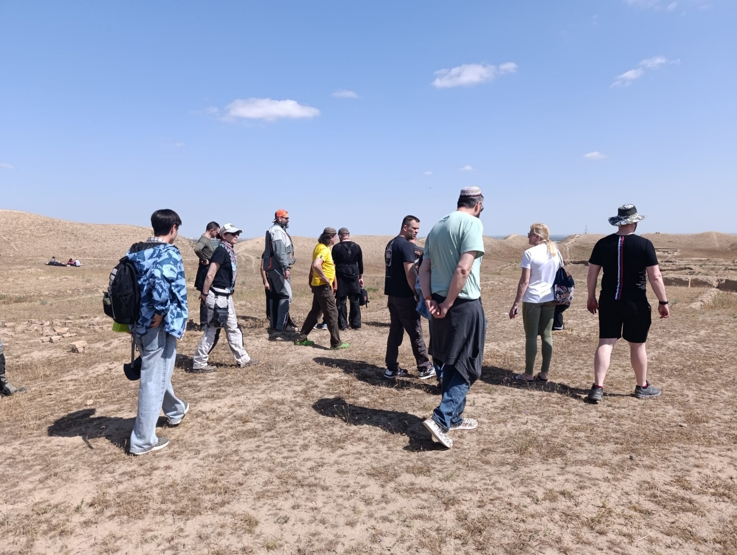 Guided Tour Through Ancient Nisa Guided tour group walking across the archaeological landscape of Ancient Nisa near Ashgabat