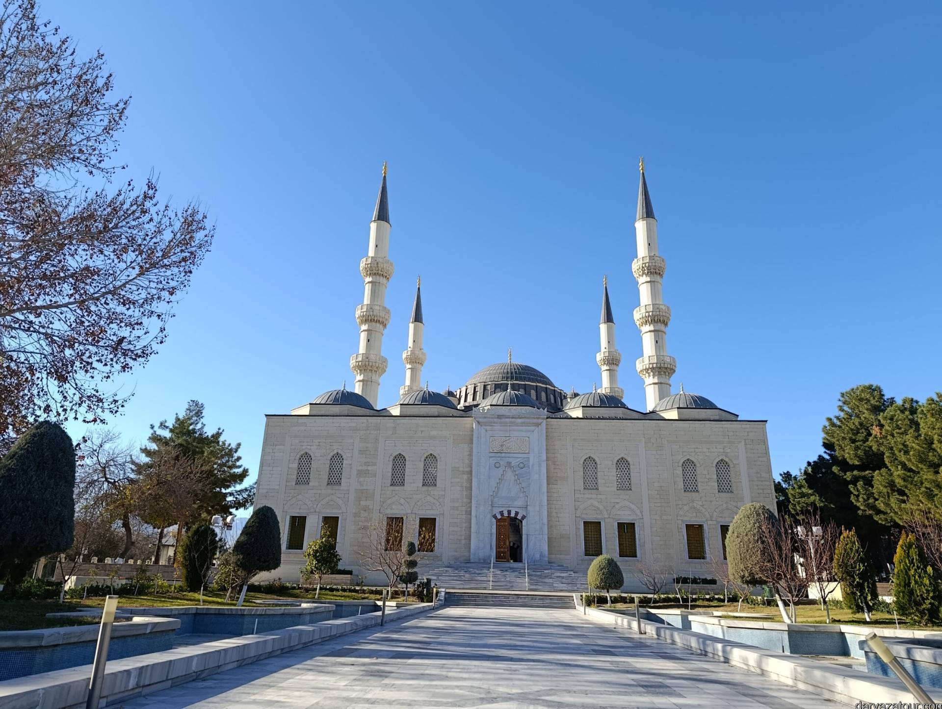 Front view of the Ertugrul Gazi Mosque and its Ottoman-style architecture in Ashgabat
