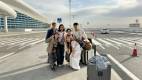 3 Day Turkmenistan Tour from Ashgabat: Darvaza & Night Train to Bukhara Hong Kong Tourists at Ashgabat International Airport